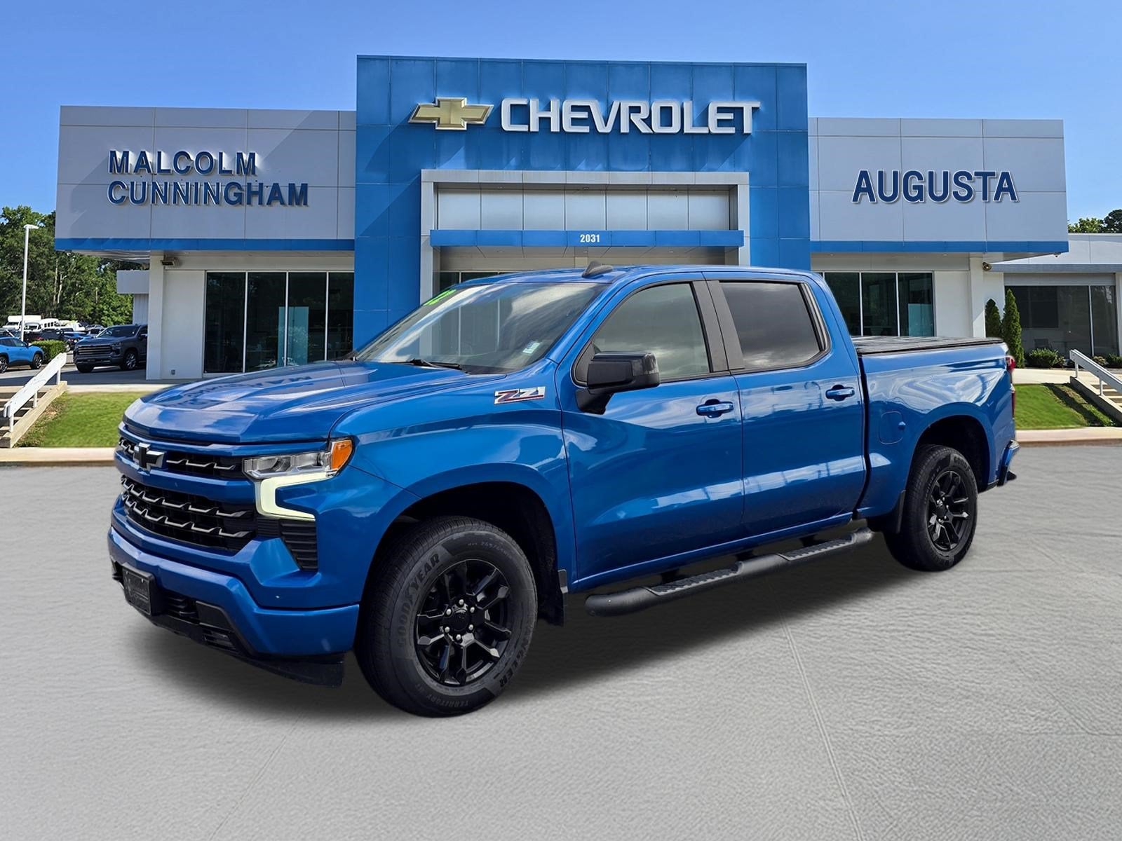 2022 Chevrolet Silverado 1500 RST in Glacier Blue Metallic — front three-quarter view