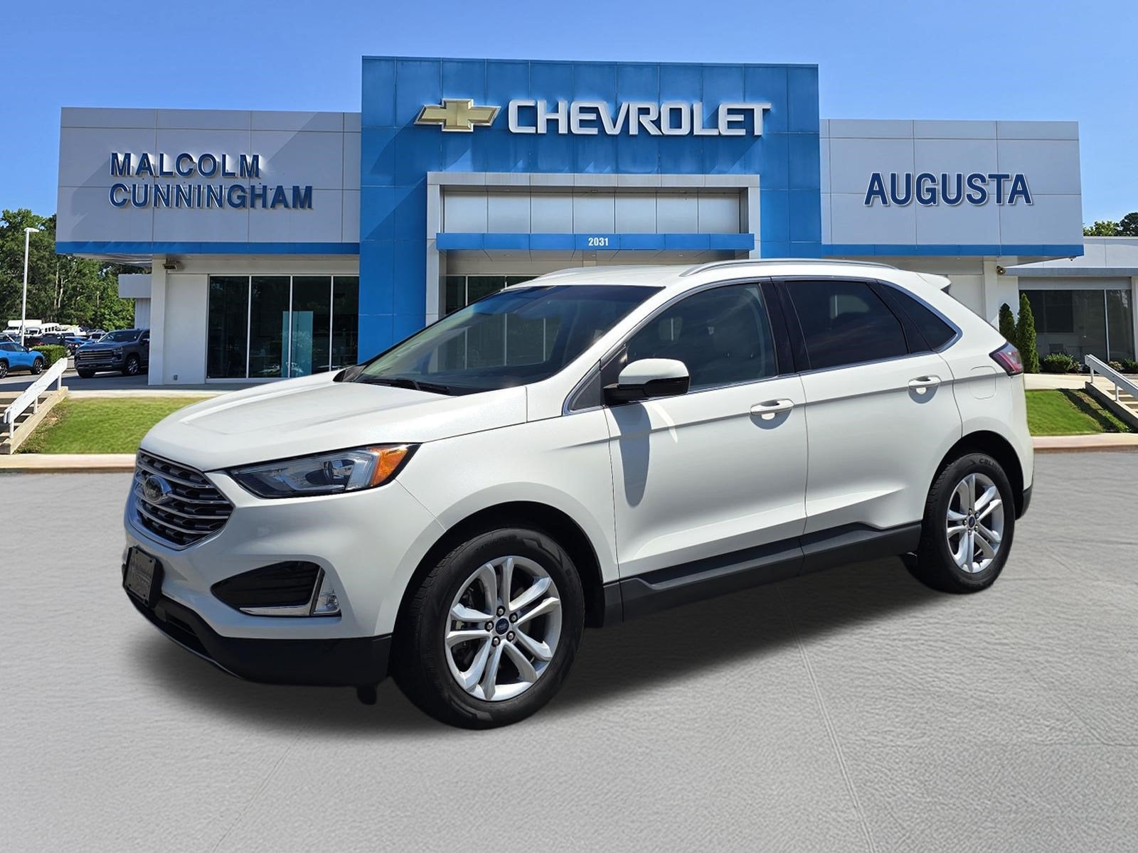 2020 Ford Edge SEL in White — front three-quarter view