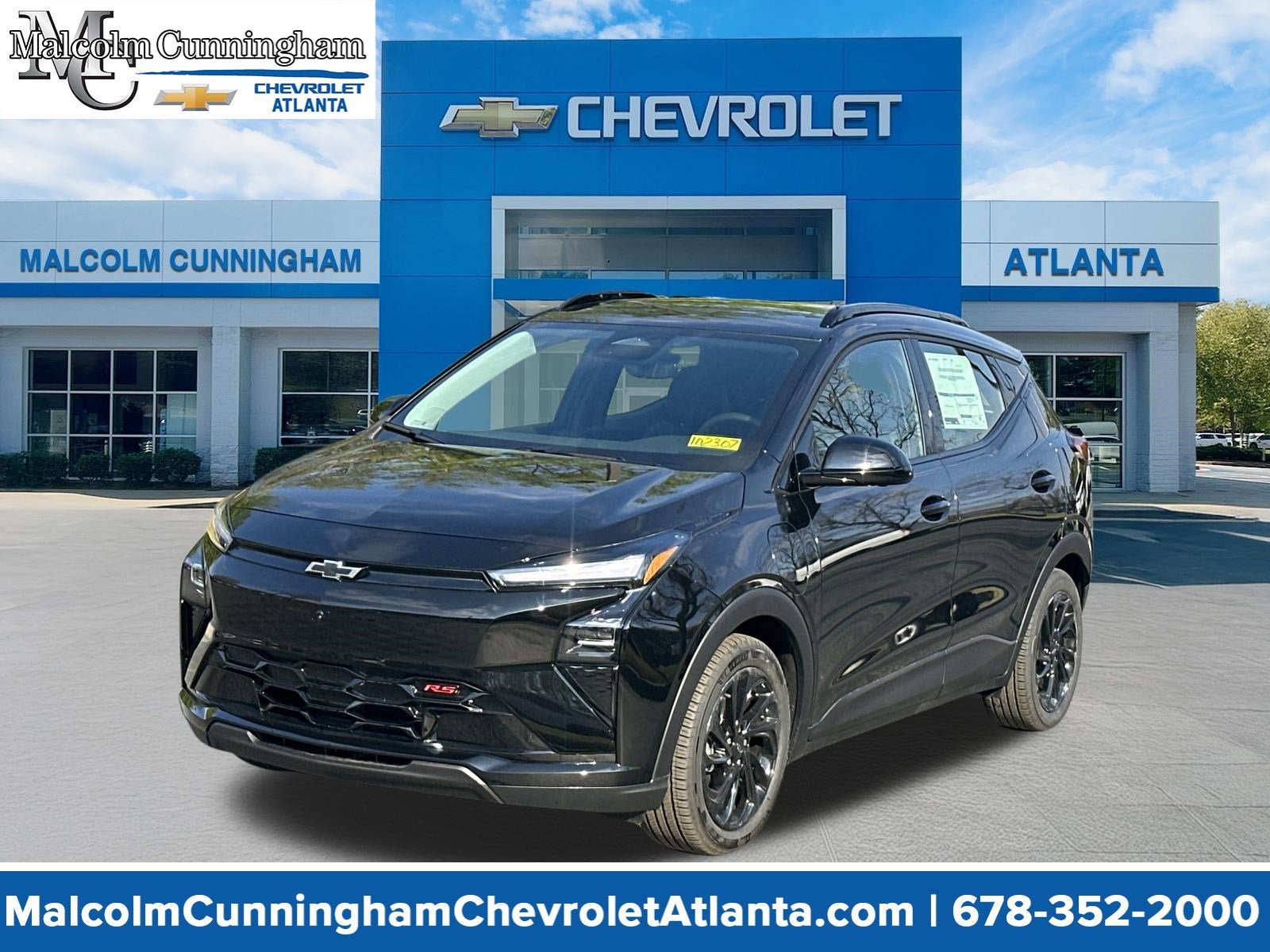 2027 Chevrolet Bolt RS in Mosaic Black Metallic — front three-quarter view