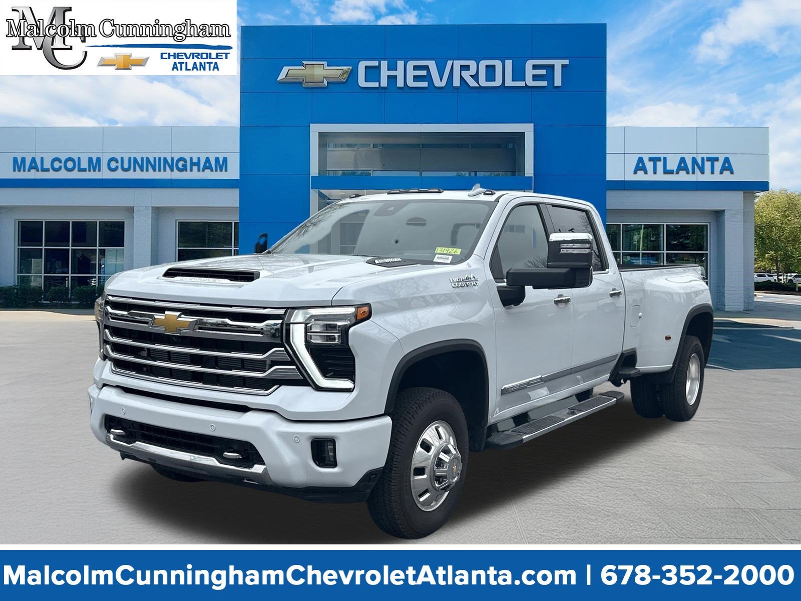 2026 Chevrolet Silverado 3500 HD High Country DRW in Polar White Tricoat — front three-quarter view