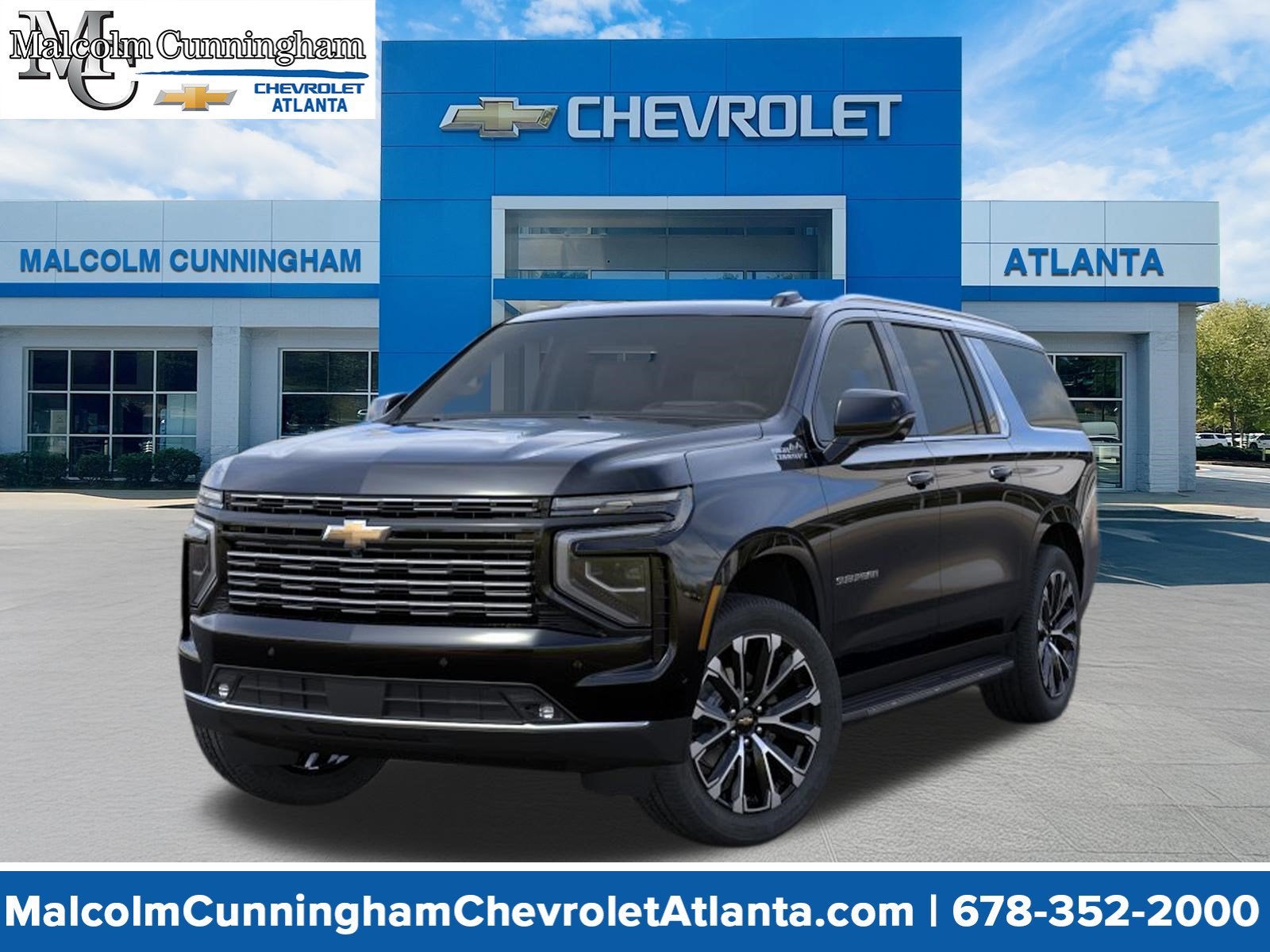 2026 Chevrolet Suburban High Country in Black — front three-quarter view