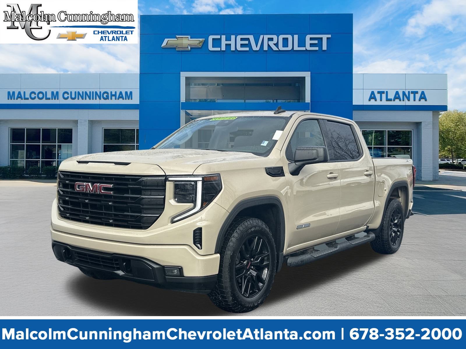 2023 GMC Sierra 1500 Elevation in Desert Sand Metallic — front three-quarter view