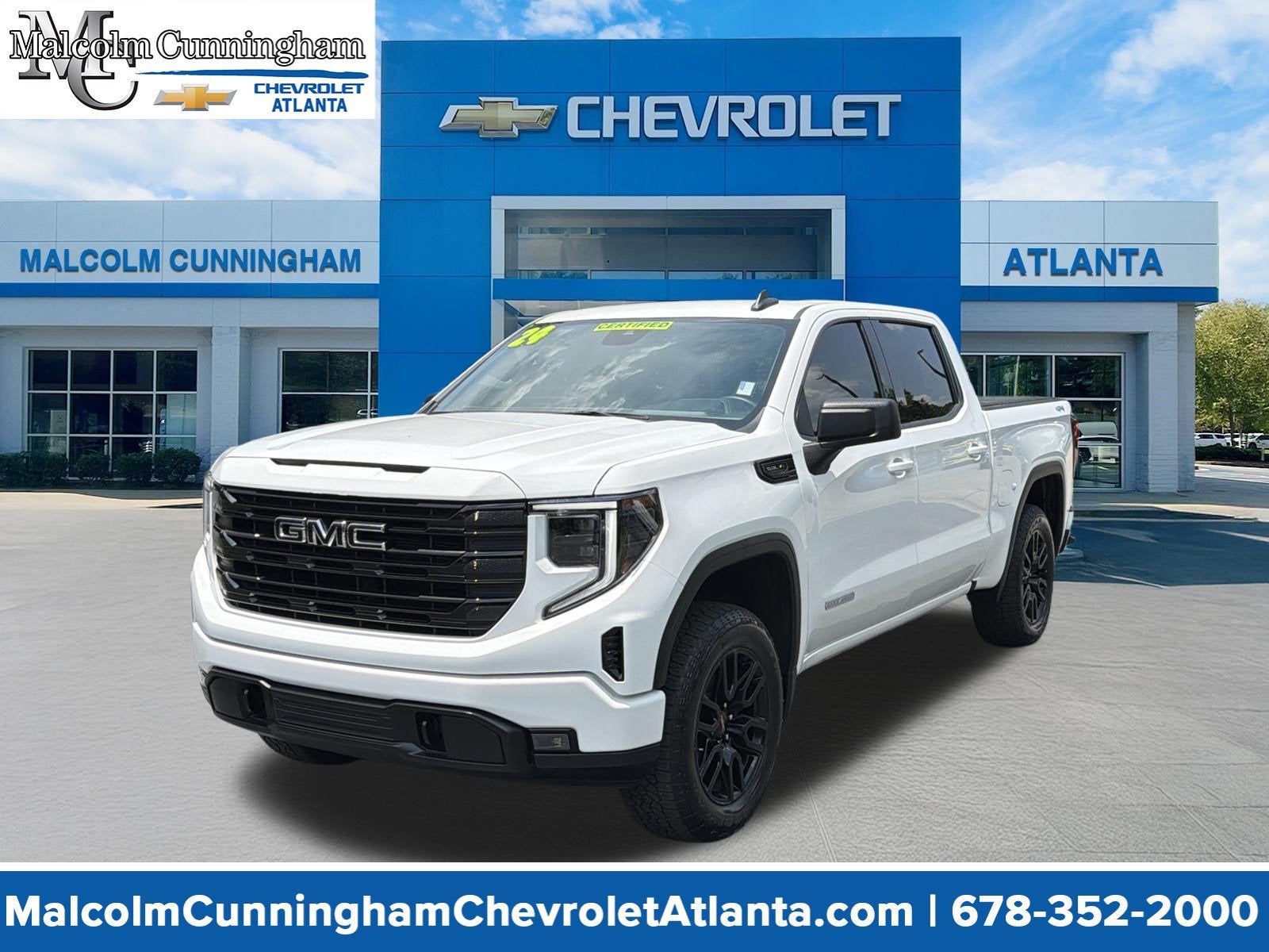 2024 GMC Sierra 1500 Elevation in Summit White — front three-quarter view