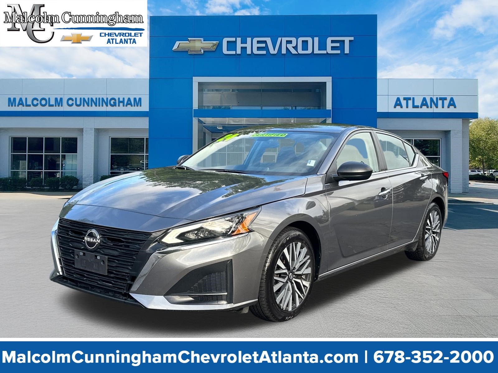 2024 Nissan Altima 2.5 SV in Gun Metallic — front three-quarter view