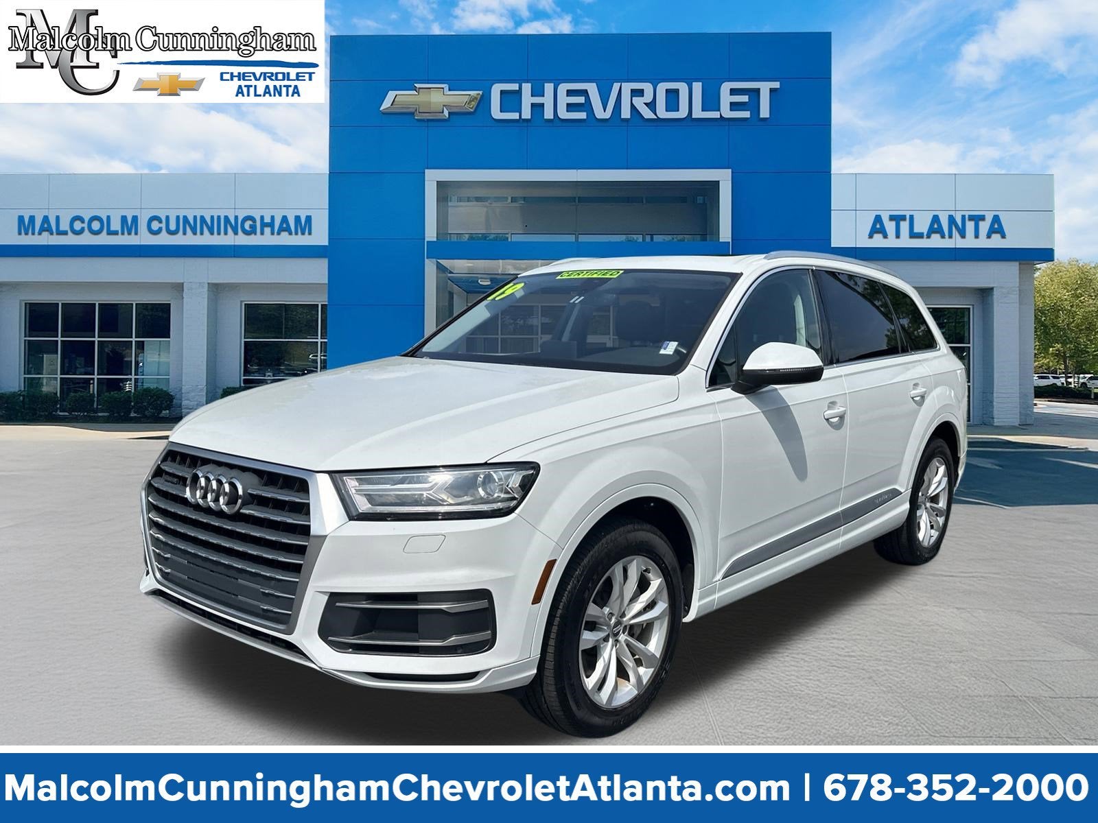 2019 Audi Q7 45 Premium in White — front three-quarter view